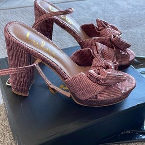Brand new Lulu’s Lilsa pink bow platform heels.